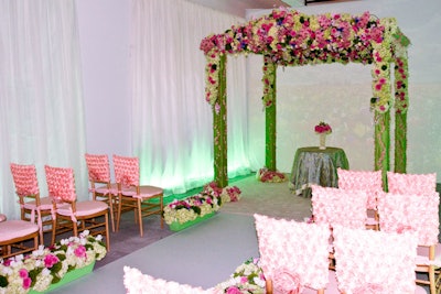 The second ceremony featured a spring theme with a pink-and-green color scheme.