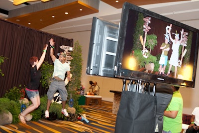Groupon hosted its Camp Groupon event last July at the Swissôtel Chicago. Kehoe Designs spruced up the hotel with thematic decor for the weekend, including a photo station area with a woodsy backdrop that included life preservers, boat paddles, and bundled logs.