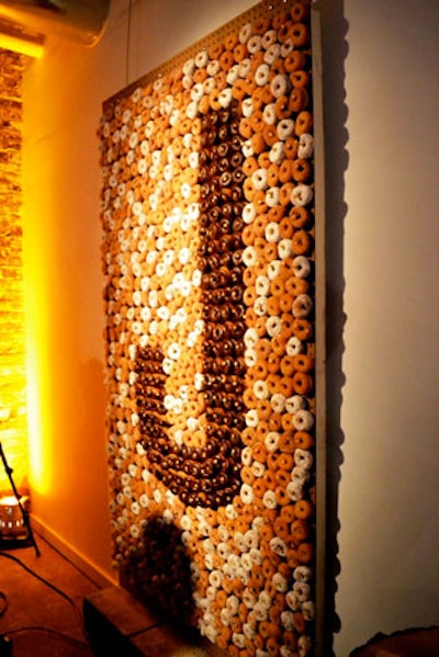 Evoke, the event design and planning company based in Washington, D.C., designed this doughnut wall out of Pegboard, with 1,200 wooden golf tees holding chocolate-glazed, cinnamon-sugar, and powdered doughnuts. A server with a step stool is on hand to pull doughnuts off the wall. Design Cuisine executed the concept.