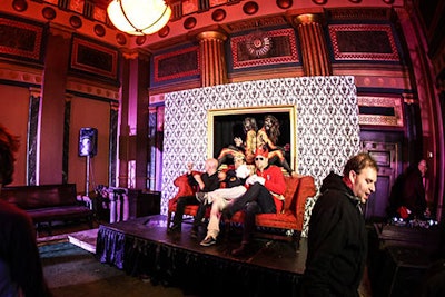 For Dos Equis's 'Most Interesting Masquerade,' held in Chelsea's historic Masonic Hall in New York and produced by Mirrorball, body painter Craig Tracy drew half a lion's face on the sides of two models. When the models sat back-to-back inside a gold picture frame, the full face of the lion was visible and formed the backdrop of a photo op.