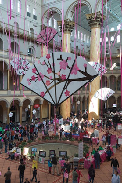 Chicka Chicka Boom Boom suspended oversize cutouts of cherry blossom blooms and Japanese paper fans from the ceiling of the museum.