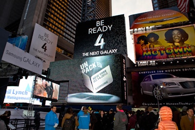 An LED screen in Times Square teased the launch of the Samsung Galaxy S4. Later, it switched to a live feed from Radio City Music Hall, where Samsung executives unveiled the phone.
