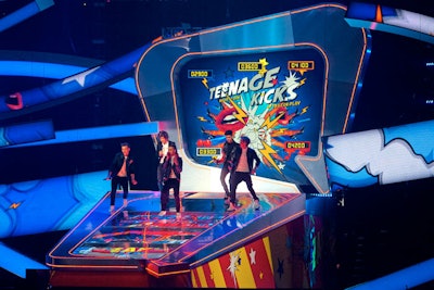The band One Direction performed on XL's giant pinball machine.