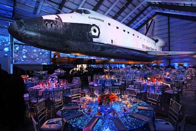 Guests dined under the wings of the massive space shuttle Endeavour.