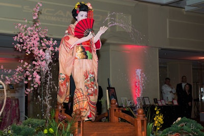 Japanese geishas performed fan and water dances on the bridge of the mini garden throughout the night.