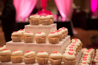 Festival sponsor Georgetown Cupcake topped cherry-vanilla cupcakes with cream cheese frosting and a single fondant cherry-blossom petal.