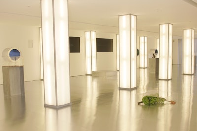 As a twist on the white-on-white look, Calvin Klein launched Euphoria in 2005 with an artsy installation that put the fragrance's tropical derivatives in display cases atop pedestals and on the floor. Videos of tropical landscapes could be viewed through metal portholes in the walls of the TriBeCa venue.