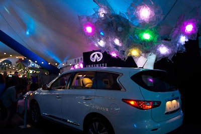 Sponsor Infiniti staged a photo station area inside the tent, where one of the auto brand's cars sat underneath a whimsical tree adorned with tulle and colored lights.