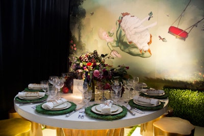 Many designers had spring on the mind, with several environments dedicated to garden motifs. Rachel Laxer Interiors with Robert Kuo designed an ode to Rococo painter Jean-Honoré Fragonard with a mural of an 18th-century woman falling from a swing and a centerpiece of moody floral arrangements and fresh fruit.
