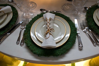 Rachel Laxer Interiors' table settings included moss-covered chargers and—similar to the Kinky Boots table—corseted napkin holders.