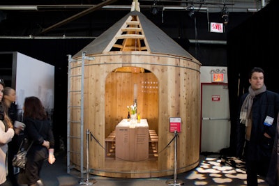 Federico Delrosso for Corinthian Capital Group built a dining room inside a fabricated rooftop-style water tower. New York City rooftop views were projected onto the walls inside.