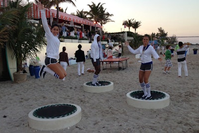 Alongside invited guests, models participated in the bevy of beach games, activities that included jumping on trampolines.