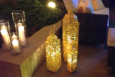 Lanterns dotted areas around alfresco seating groups and hung from trees.