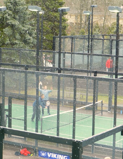 A bird's-eye view of the snowy action from the second floor of the Indian Trail Club McBride House.