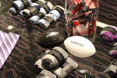At this year's Super Bowl, retailer Express hosted a pop-up shop at the Hyatt French Quarter where invited celebrities and athletes could choose from several button-down shirts and have them embroidered right on the spot. The display also included matching ties and other accessories, as well as a lounge area.