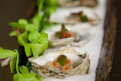 For savories, stations held snacks inspired by traditional cuisines from Hong Kong, Beijing, Shanghai, Tokyo, and Bangkok. There were also passed bites, including oysters with sweet onion salsa served on an orchid-strewn tray.