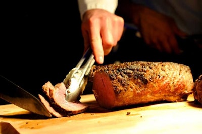 In the more masculine event space, chefs carved meats for guests.