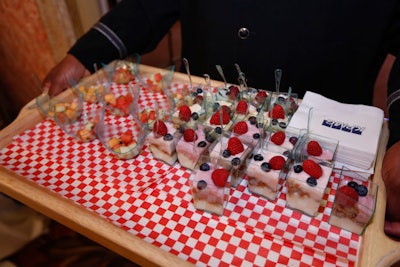 Guests also noshed on yogurt with fruit and granola. The miniature parfaits were passed on trays decked in cute, checkered napkins.