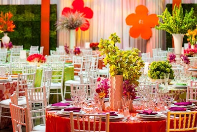 With Andy Warhol art on the walls of the atrium, Eric Michael and Jack Lucky used a 1970s-inspired color palette of bright orange, yellow, pink, and neon green. Perfect Settings provided linens in each of these colors to create alternating color blocks from table to table.