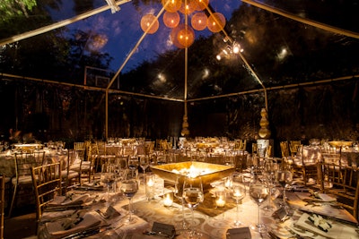Dinner party inside clear top tent