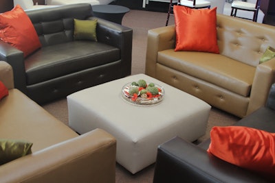 Sofas with ottoman and pillow accents