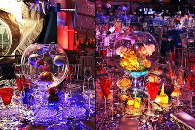 Dinner at the California Science Center’s Discovery Ball, held in Los Angeles in March, took place underneath the wings of the Endeavour space shuttle. Reflecting the space theme, illuminated tables were topped with mini solar systems and tropical flowers in glass bowls.