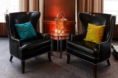 CORT's new Silk Pillows proved to be the perfect accent of color with the sophisticated Harley Wing Back Chairs.