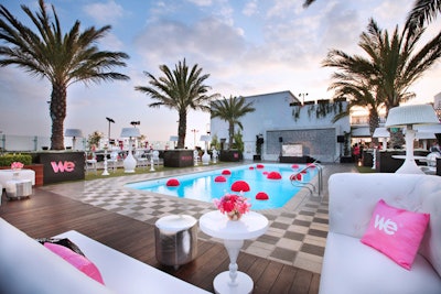 The 2011 premiere party for WE TV's Braxton Family Values—a show about singer Toni Braxton—took place atop the London West Hollywood and featured a decidedly feminine look. To gussy up the central pool, florist C.J. Matsumoto covered foam spheres in bright pink flowers, then attached the arrangements to weights anchored to the bottom of the pool.