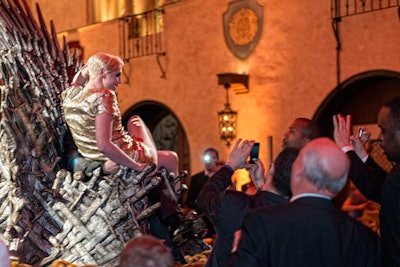 Actress Gwendoline Christie, who plays Brienne on the show, posed on a replica of the Iron Throne.