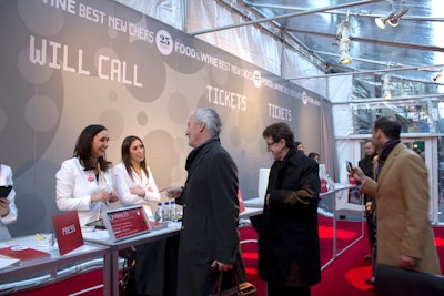 The tented check-in area was set up on the sidewalk just outside the restaurant; staffers dressed in the evening's color scheme of red, white, and silver.