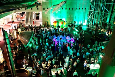 Atmosphere Lighting illuminated the main atrium of the museum differently for each of the four flights, transitioning from green to red and oranges, yellow, then blues and purples for dessert.