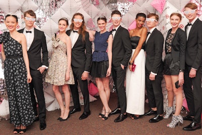 Right after check-in, a total of 20 models posed on a runway-cum-stage setup backed by a mixed media wall. Paired as prom-night-like couples, with each female model wearing a different Kate Young for Target dress, the lineup encouraged guests to vote for the best dressed couple by tweeting or instagramming pictures with the #KateYoungTarget hashtag.