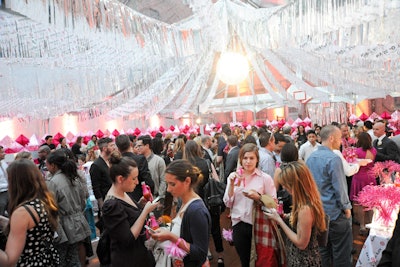 Of the 5,000 square feet Target utilized for the event, 2,600 square feet was dedicated to the gymnasium alone. Multiple clear vinyl tents were pieced together to make one large tent while external air-conditioning units were brought in to keep the space cool. The walls came down during the party, leaving only the roof—from which hung miles of streamers and one disco ball.