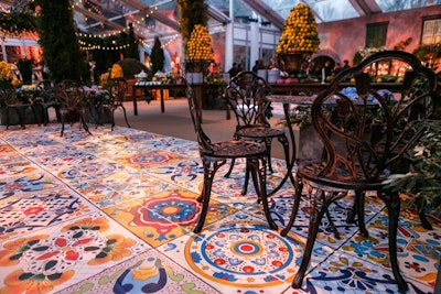 A tent behind Villa Firenze was designed as an Italian piazza with flooring that mimicked colorful Italian tile. The pattern, created for the event, also was used in the program book.