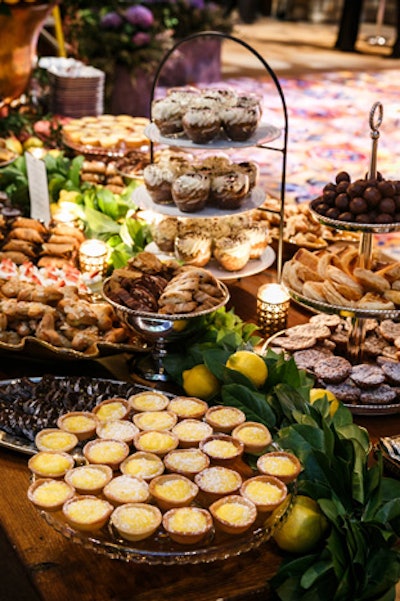 A dessert buffet offered treats from several regions of Italy including crostata di crema al limone and salame di cioccolato from Emilia-Romagna as well as tiramisù and biscotti from Tuscany.
