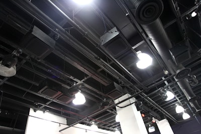Intelligent lighting and custom sound system installed into ceiling directly above dance floor area.
