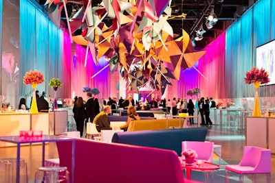 Lounge furniture was asymmetrically positioned and sectioned off into areas that held pink, yellow, or purple rentals.