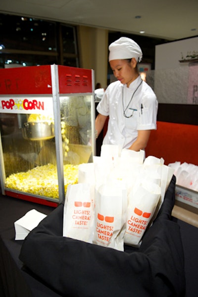 Since no movie night would be complete without popcorn, staffers filled on-theme paper bags with the snack for guests in the lobby.