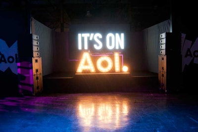A stage in the reception space featured AOL's logo in marquee lights.