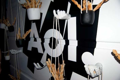 Pinch Food Design presented food in unusual ways, including hanging containers of breadsticks from a wall.