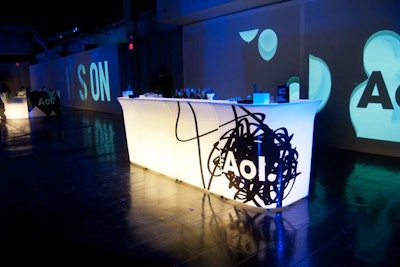 The black-and-white decor included illuminated bars with graffiti-style AOL branding.