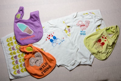Screen print onesies at a custom baby shower