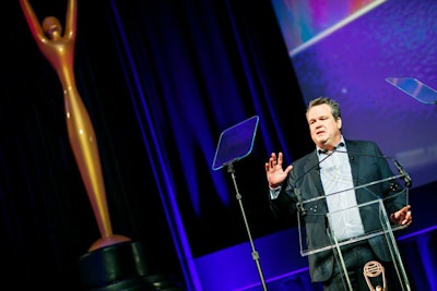 Actor Eric Stonestreet, a veteran of TV commercials, hosted the awards. Throughout the show, he poked fun at his pre-sitcom star days by screening old ads like one in which he played a giant blue 'X' in an Arizona Lottery commercial.