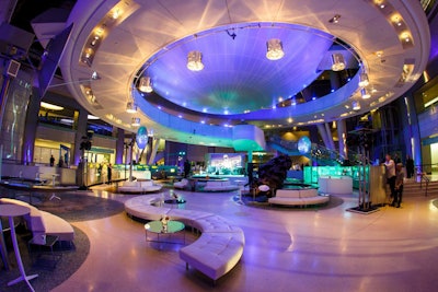 Stoelt Productions designed the after-party around giant moon rocks and meteorites in the space-themed Cullman Hall of the Universe. Sleek white leather furniture and 10 chandeliers lined the exhibits and adhered to the architecture of the space, and spherical and circular decor elements were used throughout.