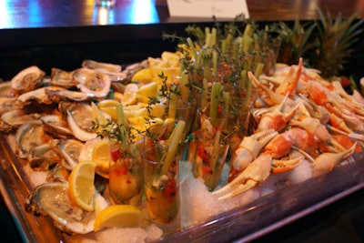 Chilled shrimp and a bloody Mary shooter with a souvenir shot glass