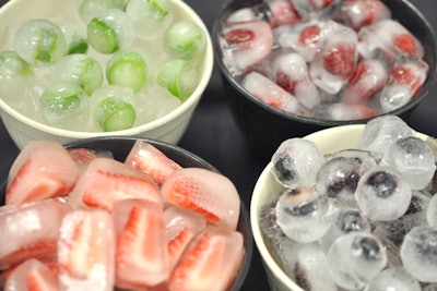 Maria Zoitas of Maria’s Homemade recommends adding fruit-infused ice cubes to drinks at summer parties. Just add berries, grapes, or pomegranate seeds to the water in ice cube trays, then toss the final product into champagne mixed with hibiscus syrup.