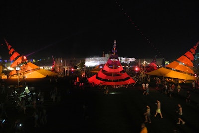 The Do Lab's central art piece at Coachella took on an ombré look this year, in colors that seemed to evoke desert flowers. The structures provided shade in the sweltering daylight hours, and they served as a meeting point and a stage for performances that included the work of Lucent Dossier.