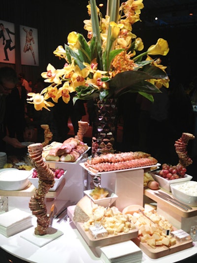 A buffet of local farm cheeses included rustic-style baguettes displayed on curved towers.