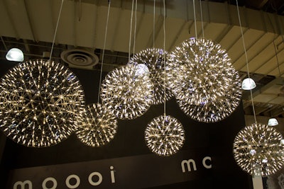 Moooi showed a line of hanging lamps that look like modern disco balls.