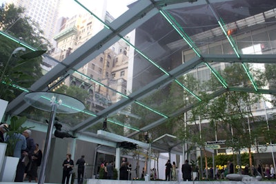 Before heading into the museum for dinner, guests gathered in the sculpture garden for a cocktail reception. Neon tubes lined the ceiling of the clear-top tent.